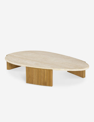 Angled overhead view of the Rayan travertine top and fluted leg coffee table