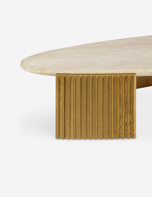 Close up of the Rayan travertine top and fluted leg coffee table