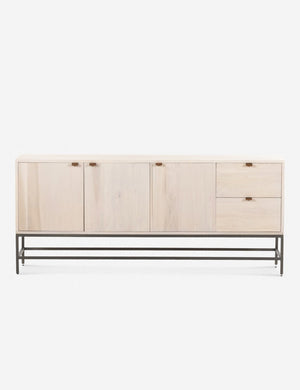 Rosamonde natural wood sideboard with brown leather pulls and a metal base
