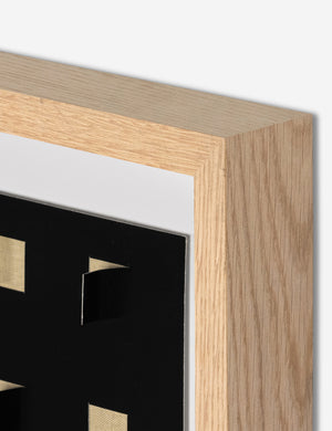 Corner of the See through small tan and black wall art