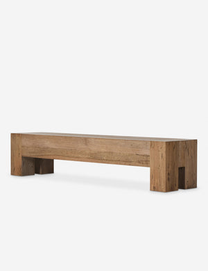 Angled view of the Bevan chunky leg distressed wood bench in natural.