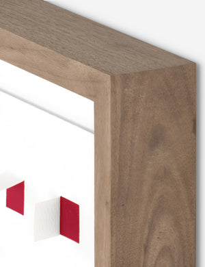 Corner of the See through small cherry red and white wall art