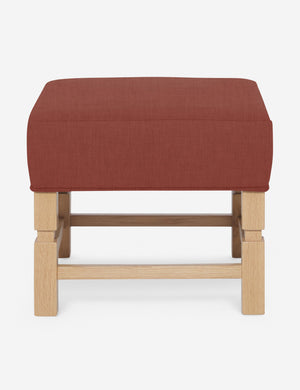 Ambleside Terracotta linen upholstered ottoman by Ginny Macdonald with a carved frame and vertical channeling on the cushion