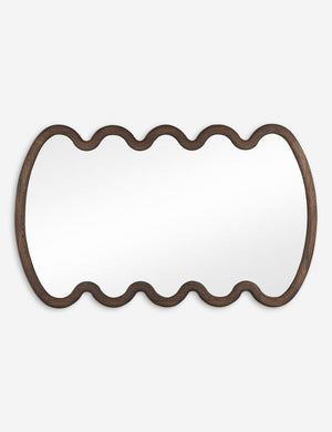 Nanala modern wavy large wall mirror hung horizontally.