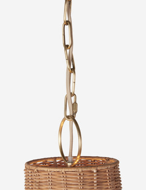 Close up of the Marzo scalloped shade woven rattan pendant light.