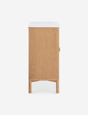Side profile of the Matija marble top, reeded door front cabinet