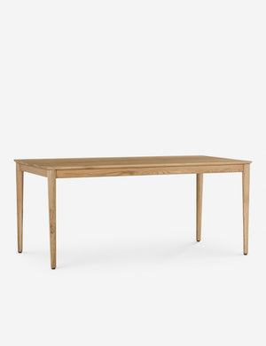 Angled view of the Lussier natural oak tapered leg dining table
