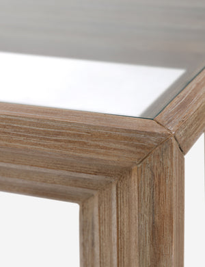 Close up view of the Pender modern wood and glass top square side table.