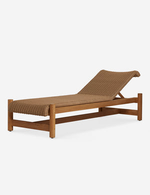 Angled view of the Gally wicker and teak outdoor chaise.