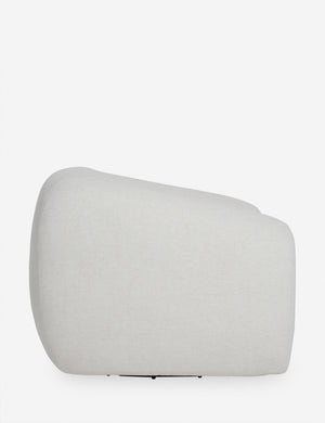 Side view of the Harlowe softly sculpted plush swivel accent chair.
