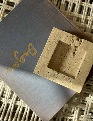 Teo catchall square tray in travertine used as decoration