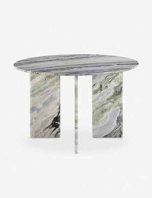 Celia sculptural round marble dining table.