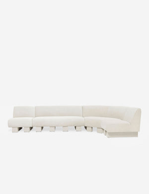 Lena right-facing natural linen sectional sofa with upholstered beam legs.