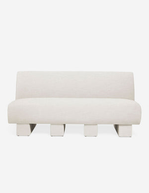 Centerpiece of the Lena natural linen sectional sofa with upholstered beam legs