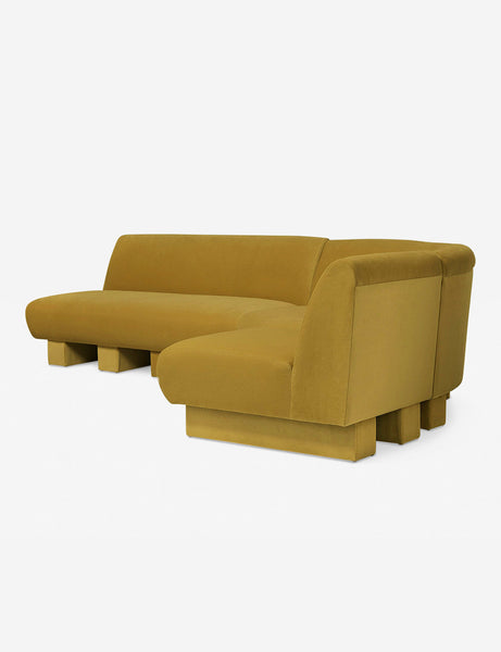 #color::goldenrod-plush-velvet #configuration::right-facing #size::114-W | Angled view of the Lena right-facing yellow velvet sectional sofa with upholstered beam legs.