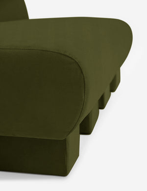 Close-up of the side of the Lena Cognac Velvet armless sofa