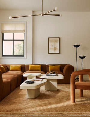 Living room featuring the Cyprus striped, tasseled, Moroccan-styled wool rug.