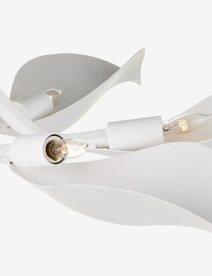 Close up of the Popelin white gesso petal-arm semi flush mount light