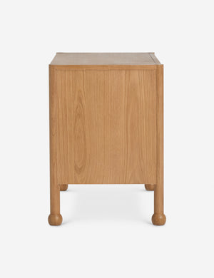Side profile view of the Fontaine wavy detailing solid oak 2-drawer nightstand by Aimee Song