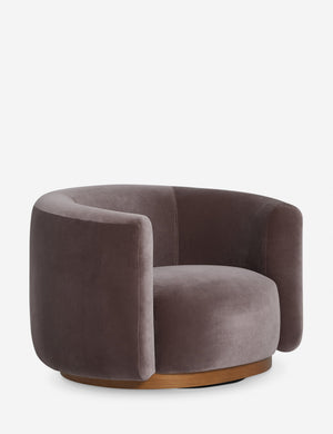 Angled view of the Lowry rounded silhouette velvet accent chair.