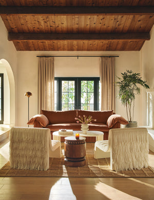 Living room featuring two of the Leon textural boucle channel tufted armless accent chair.