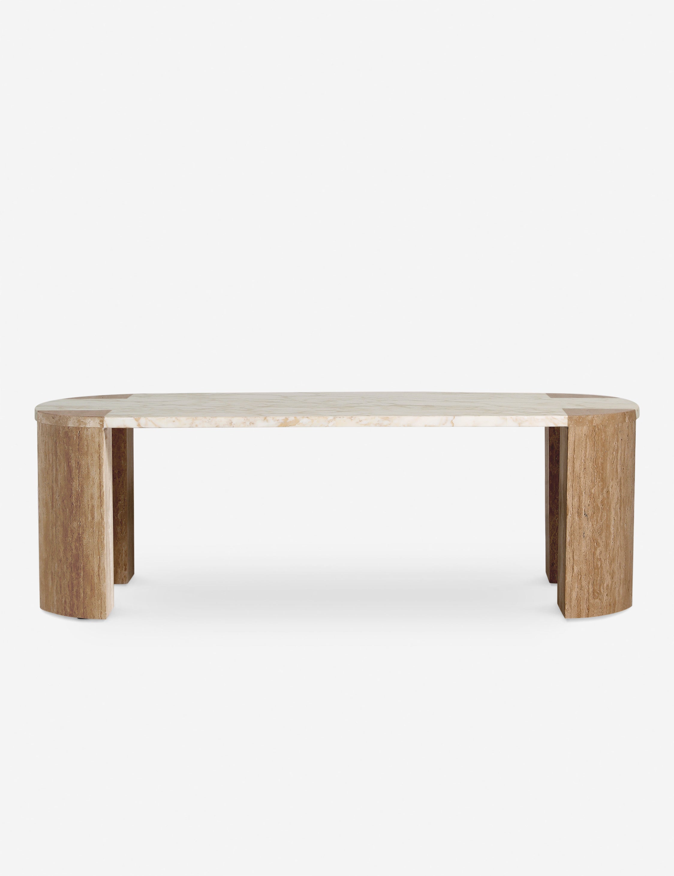 #color::travertine-and-marble | Mahoe oval marble and travertine coffee table by Carly Cushnie.