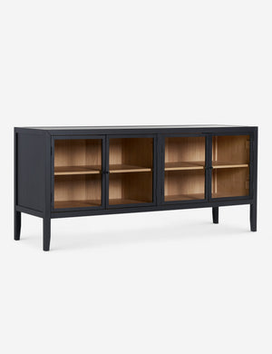 Angled view of the Morey glass front black curio sideboard cabinet