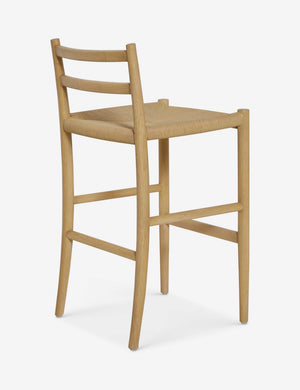Rear view of the Nicholson slim natural oak wood frame and woven seat counter stool.
