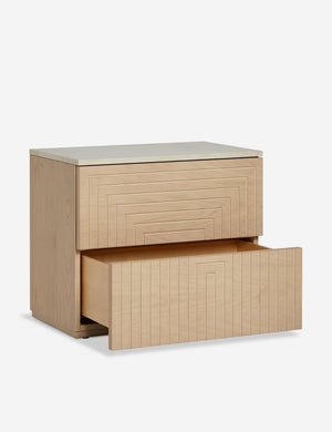 Rayner carved linear detailing oak two drawer nightstand with bottom drawer open.