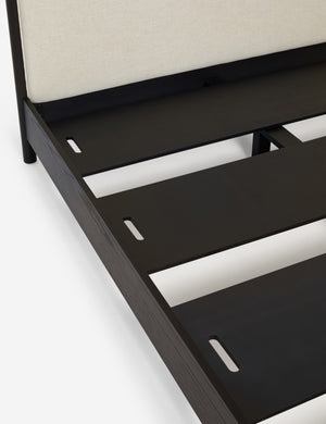 Close up view of Simonette canopy bed slatted base