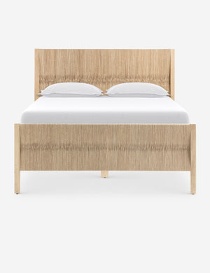 Maritza light wood and woven seagrass coastal style platform bed.