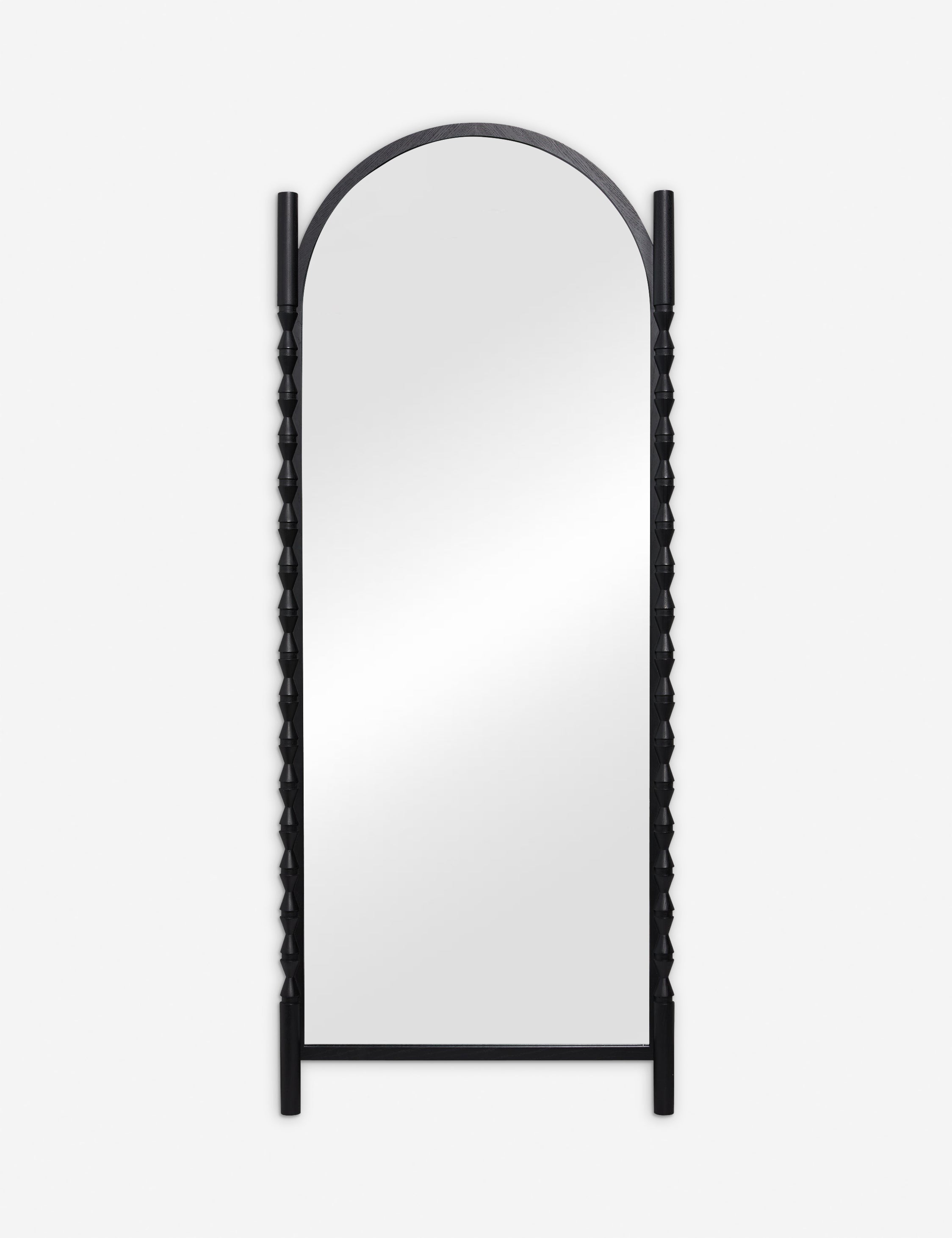 #color::black | Topia arched carved wood frame floor mirror by Ginny Macdonald in black.