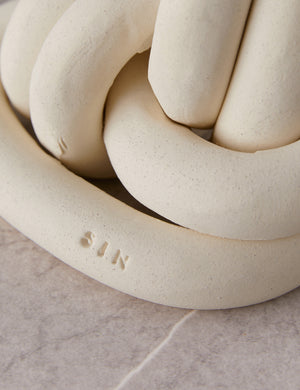 Close up view of the decorative ceramic double coil XL Fist Knot by SIN Ceramics