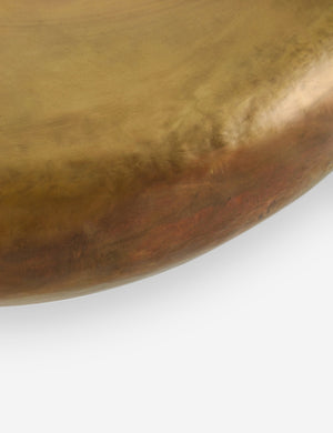 Close-up of the surface of the Arteriors bates round metallic coffee table