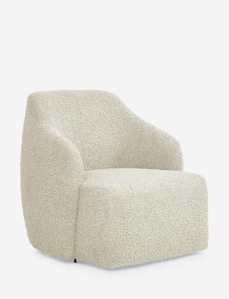 #color::cream-boucle | Angled view of the Tobi cream boucle swivel chair 