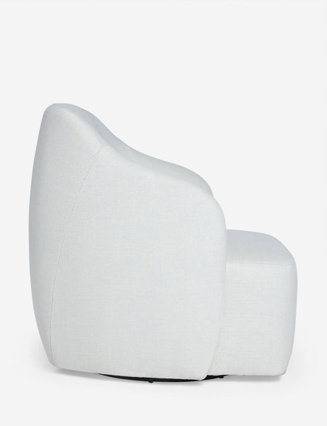 #color::natural | Side of the Tobi Natural linen swivel chair