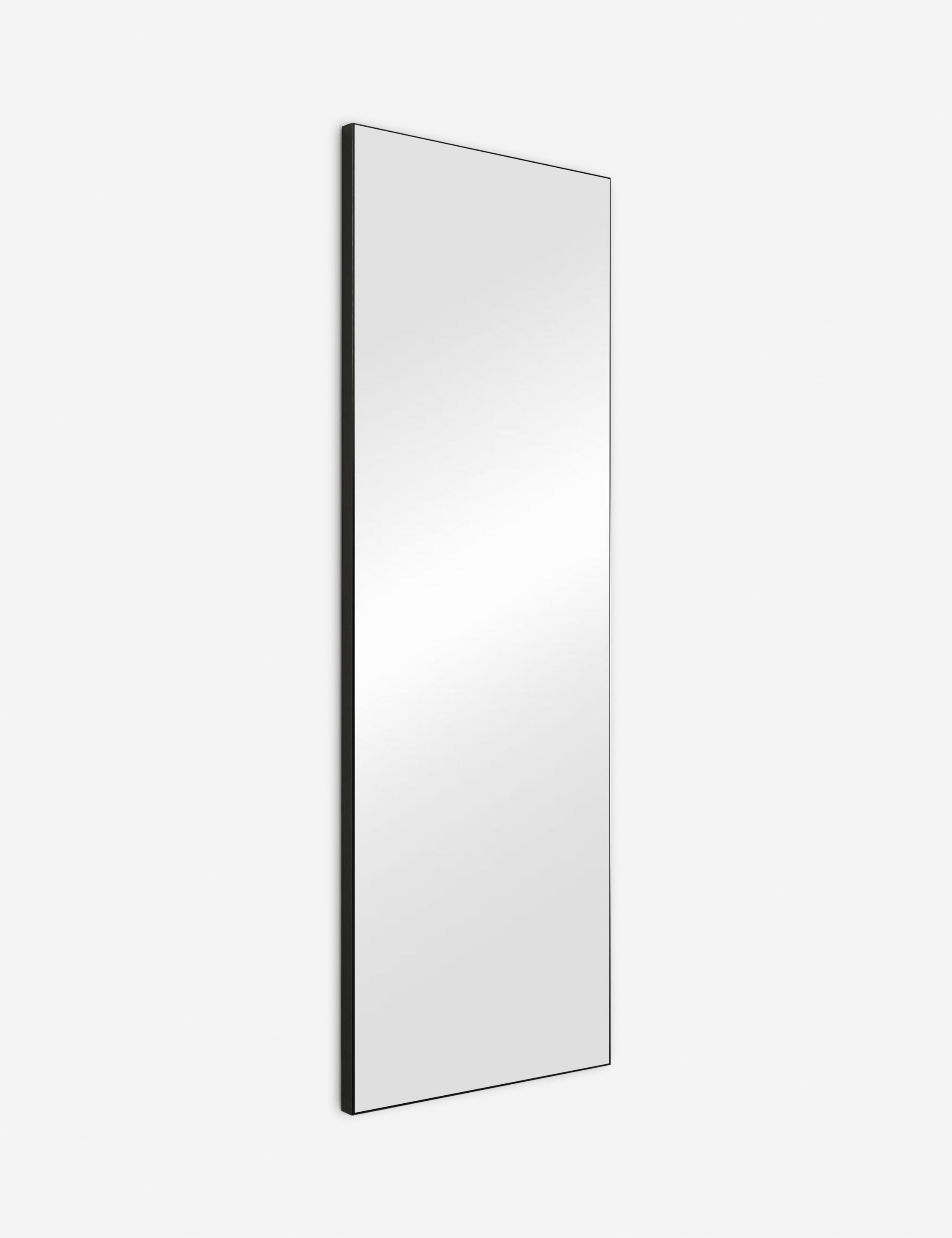 #color::black | Angled view of the Shea rectangular black framed full length floor mirror