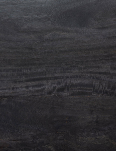 #color::black | Detailed view of the black mango wood on the Philene sideboard with cane doors