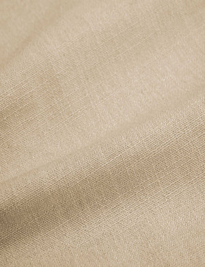 Close-up of the natural linen fabric on the Clementine platform bed