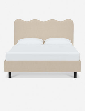 Clementine natural linen platform bed with undulating lined headboard