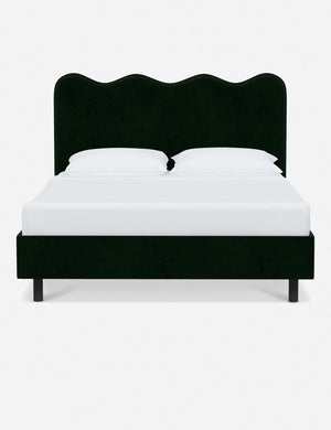 Clementine emerald velvet platform bed with undulating lined headboard