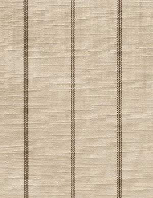 Detailed shot of the linen and stripe pattern on the Adara natural stripe linen upholstered bed.