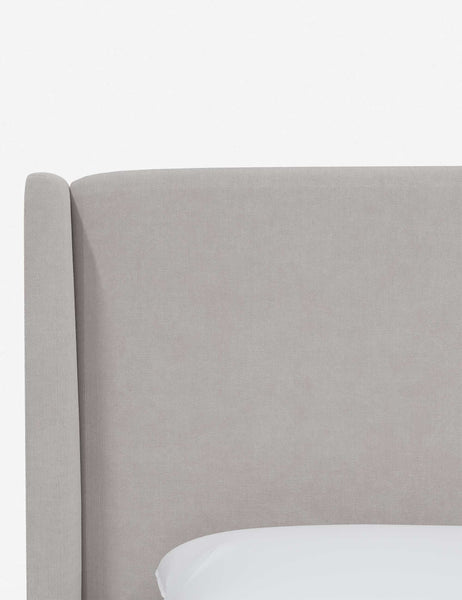 #color::mineral-velvet #size::twin #size::full #size::queen #size::king #size::cal-king | Close-up of the subtle winged headboard and trim lines on the Adara ivory velvet upholstered bed.