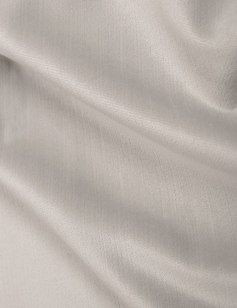 #color::mineral-velvet #size::twin #size::full #size::queen #size::king #size::cal-king | Detailed shot of the ivory velvet on the Adara ivory velvet upholstered bed. 