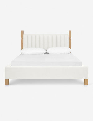 Ambleside Oyster White Linen upholstered bed with a wood-post bed frame and a headboard with vertical channeling by Ginny Macdonald