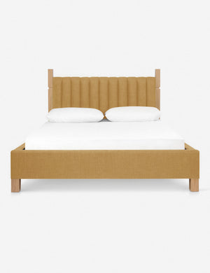 Ambleside Camel Orange Linen upholstered bed with a wood-post bed frame and a headboard with vertical channeling by Ginny Macdonald