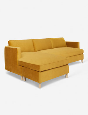 Angled view of the Belmont Goldenrod Velvet left-facing sectional sofa