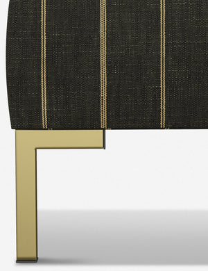 The golden leg on the Deva Peppercorn Stripe platform bed