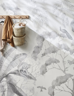 Jungle Wallpaper Mural in the black and white color on a wall with a wall hook rack.