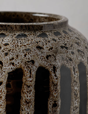 Close-up of the neck on the Wheaton full-bodied black and natural striped vase